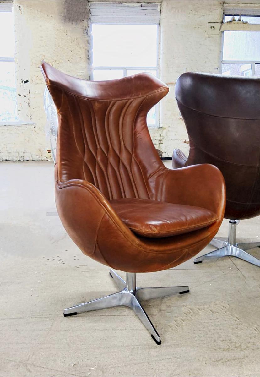 Product photograph of Aviator Enterprise Armchair Swivel Egg Vintage Tan Distressed Real Leather from Chesterfield Sofas.