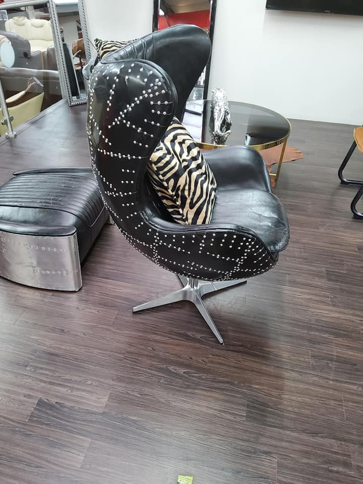 Product photograph of Aviator Aviation Swivel Egg Armchair Aluminium Vintage Black Real Distressed Leather from Chesterfield Sofas.