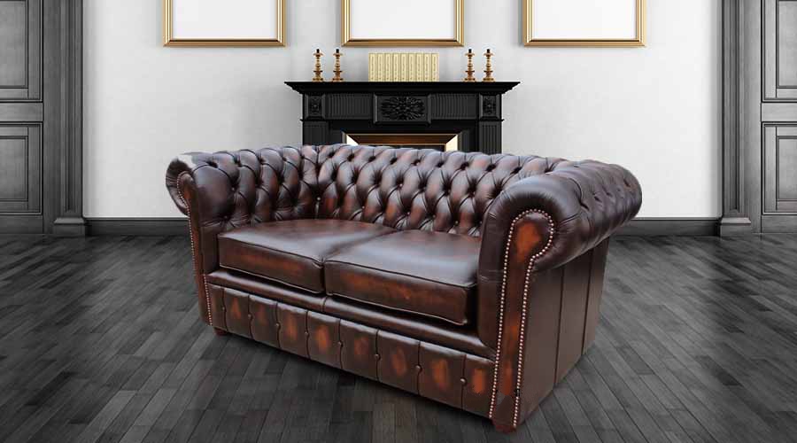 Product photograph of Chesterfield 2 Seater Antique Brown Leather Sofa Settee In Classic Style from Chesterfield Sofas