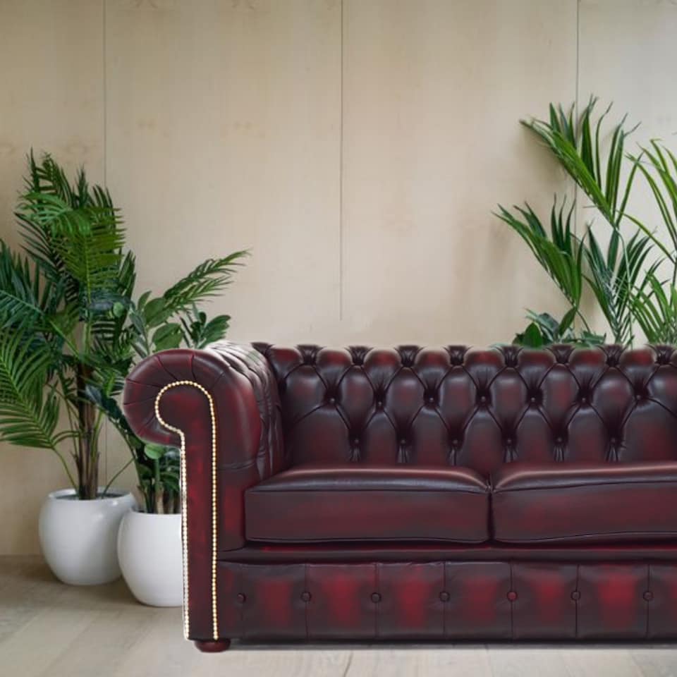Product photograph of Chesterfield 2 Seater Antique Oxblood Real Leather Tufted Buttoned Sofa Settee In Classic Style from Chesterfield Sofas.