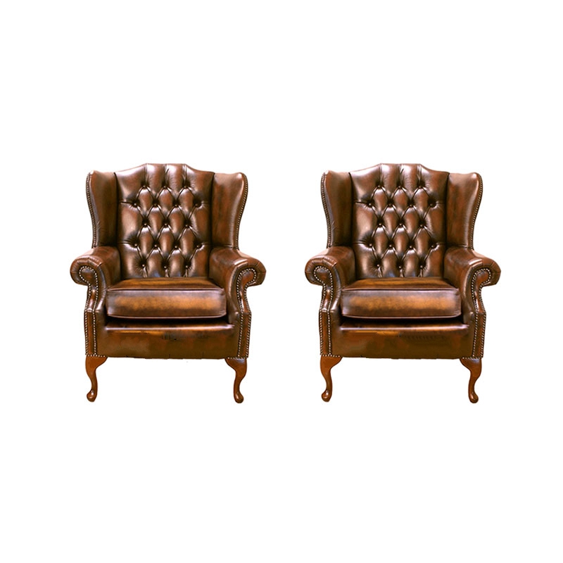 Product photograph of Chesterfield 2 X Wing Chair Antique Gold Leather Bespoke In Mallory Style from Chesterfield Sofas