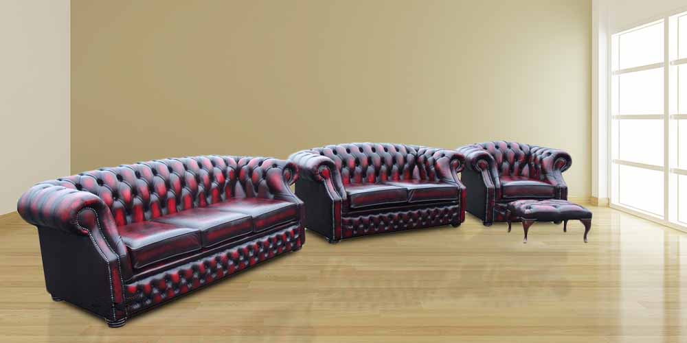 Product photograph of Chesterfield 3 2 Club Footstool Antique Oxblood Red Leather In Buckingham Style from Chesterfield Sofas