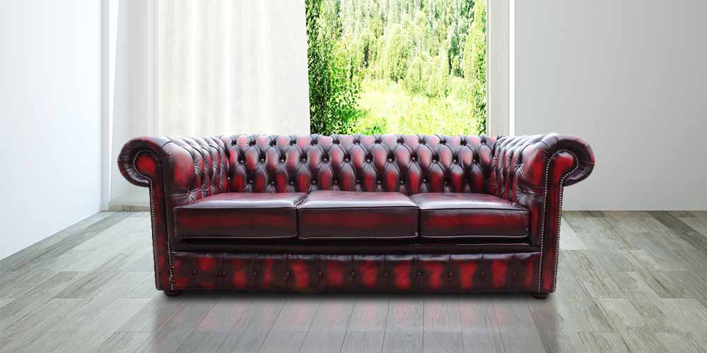 Product photograph of Chesterfield 3 Seater Antique Oxblood Red Leather Sofa In Classic Style from Chesterfield Sofas