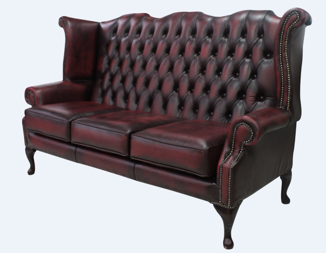 Product photograph of Chesterfield 3 Seater High Back Wing Sofa Antique Oxblood Red Leather In Queen Anne Style from Chesterfield Sofas.