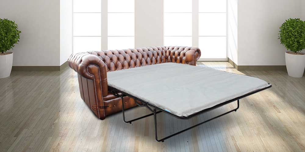 Product photograph of Chesterfield 3 Seater Sofabed Antique Tan Real Leather In Classic Style from Chesterfield Sofas