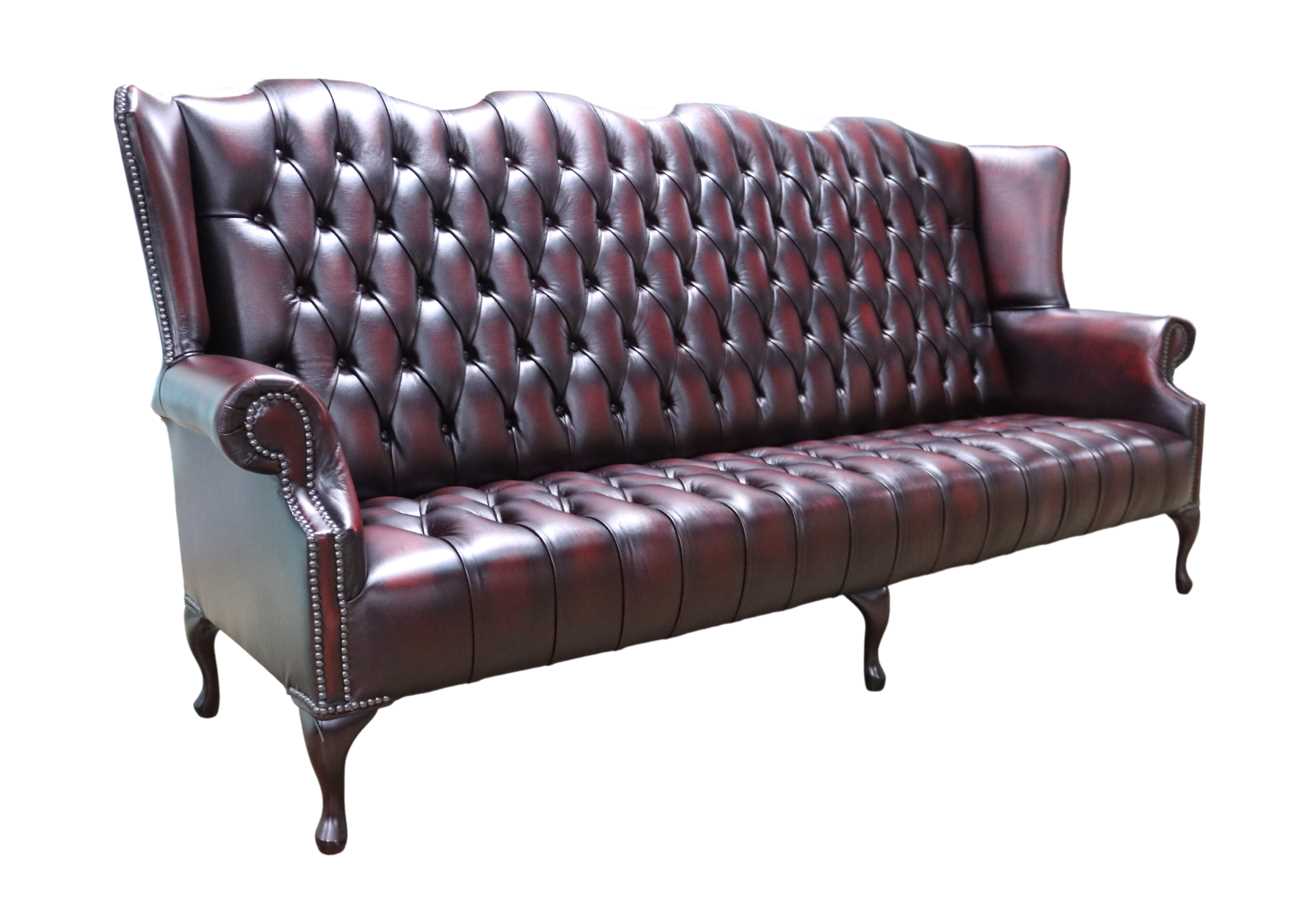 Product photograph of Chesterfield 4 Seater Buttoned Seat Sofa Antique Oxblood Leather In Queen Anne Style from Chesterfield Sofas.
