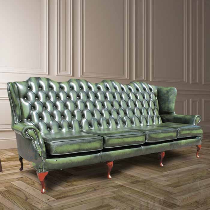 Product photograph of Chesterfield 4 Seater Flat Wing High Back Antique Green Real Leather Sofa In Queen Anne Style from Chesterfield Sofas.
