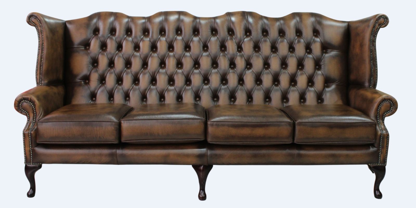 Product photograph of Chesterfield 4 Seater Flat Wing High Back Antique Tan Leather Sofa In Queen Anne Style from Chesterfield Sofas