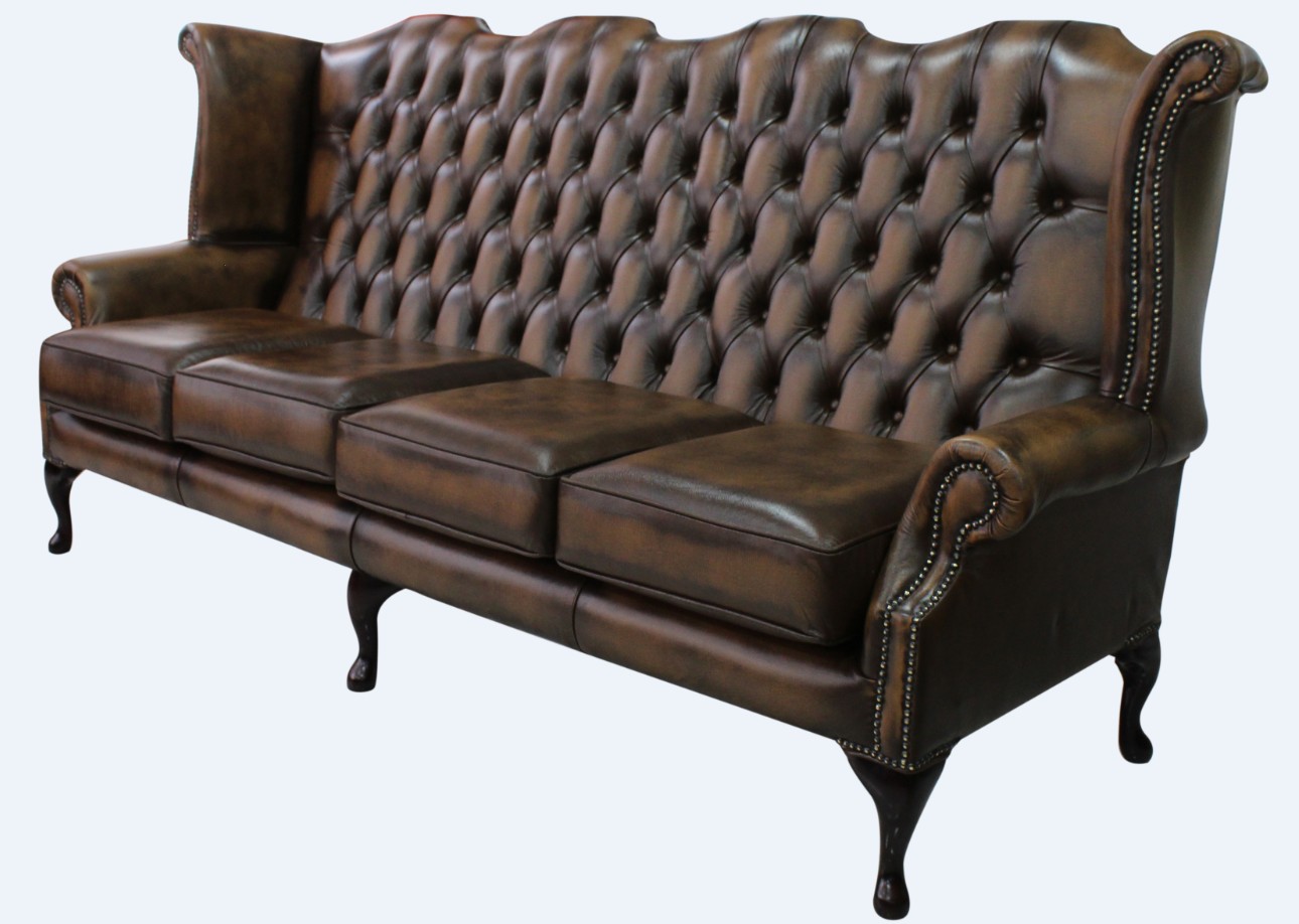 Product photograph of Chesterfield 4 Seater Flat Wing High Back Antique Tan Leather Sofa In Queen Anne Style from Chesterfield Sofas.