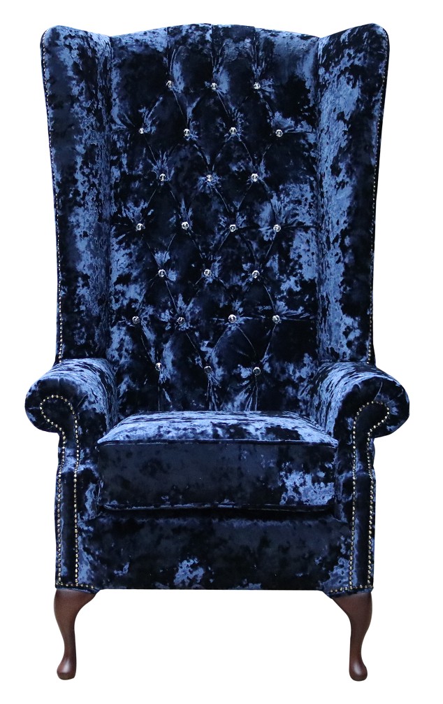 Product photograph of Chesterfield 5ft High Back Wing Chair Lustro Sapphire Blue Velvet Fabric Bespoke In Soho Style from Chesterfield Sofas.