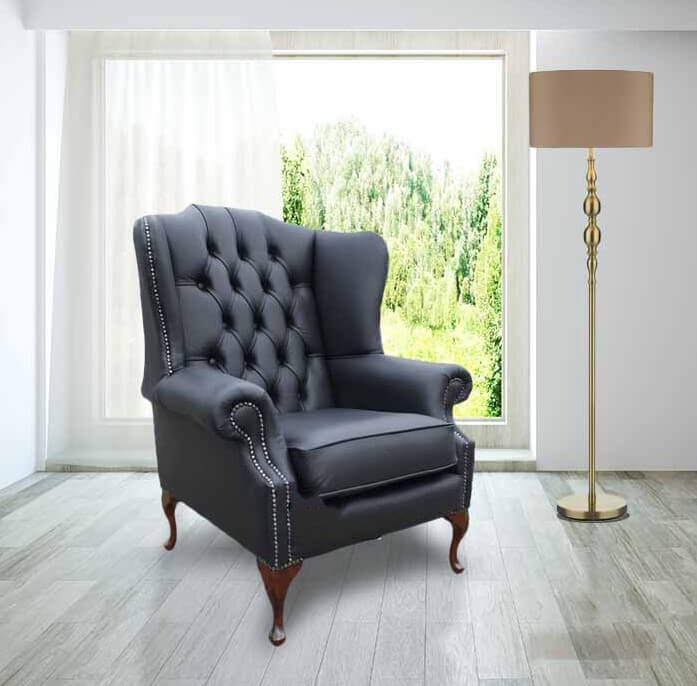 Product photograph of Chesterfield Flat High Back Wing Chair Bonded Black Real Leather In Mallory Style from Chesterfield Sofas