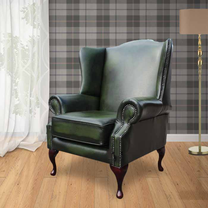 Product photograph of Chesterfield Flat Saxon High Back Wing Chair Antique Green Leather In Mallory Style from Chesterfield Sofas