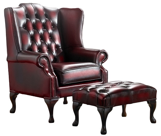 Product photograph of Chesterfield Flat Wing Chair Footstool Antique Oxblood Red Leather In Mallory Style from Chesterfield Sofas
