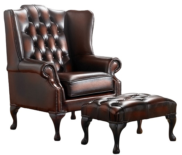 Product photograph of Chesterfield Flat Wing Chair Footstool Antique Rust Leather In Mallory Style from Chesterfield Sofas