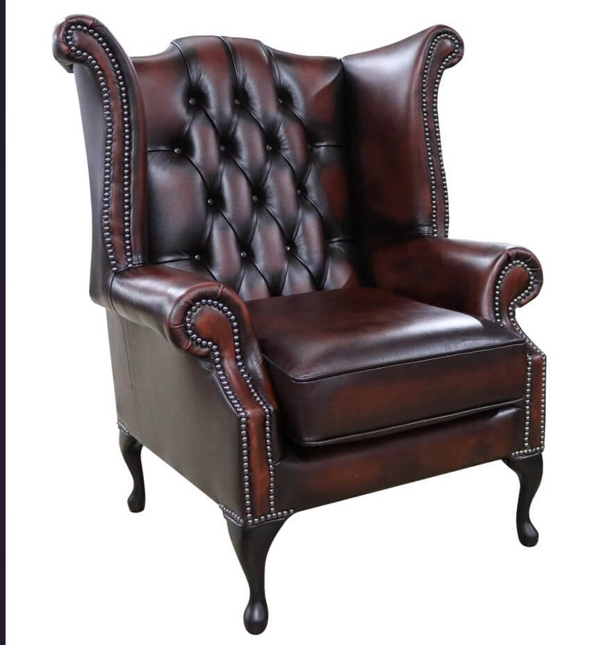 Product photograph of Chesterfield Georgian Wing Chair Antique Rust Leather In Queen Anne Style from Chesterfield Sofas