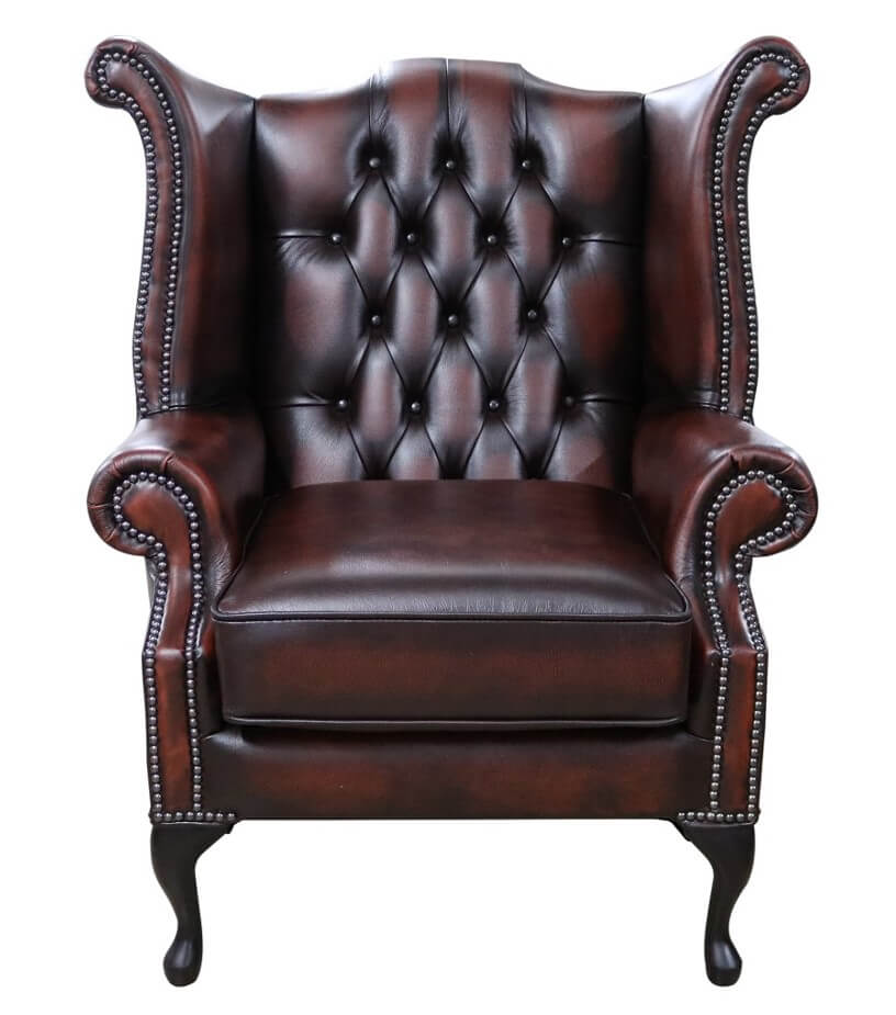 Product photograph of Chesterfield Georgian Wing Chair Antique Rust Leather In Queen Anne Style from Chesterfield Sofas.