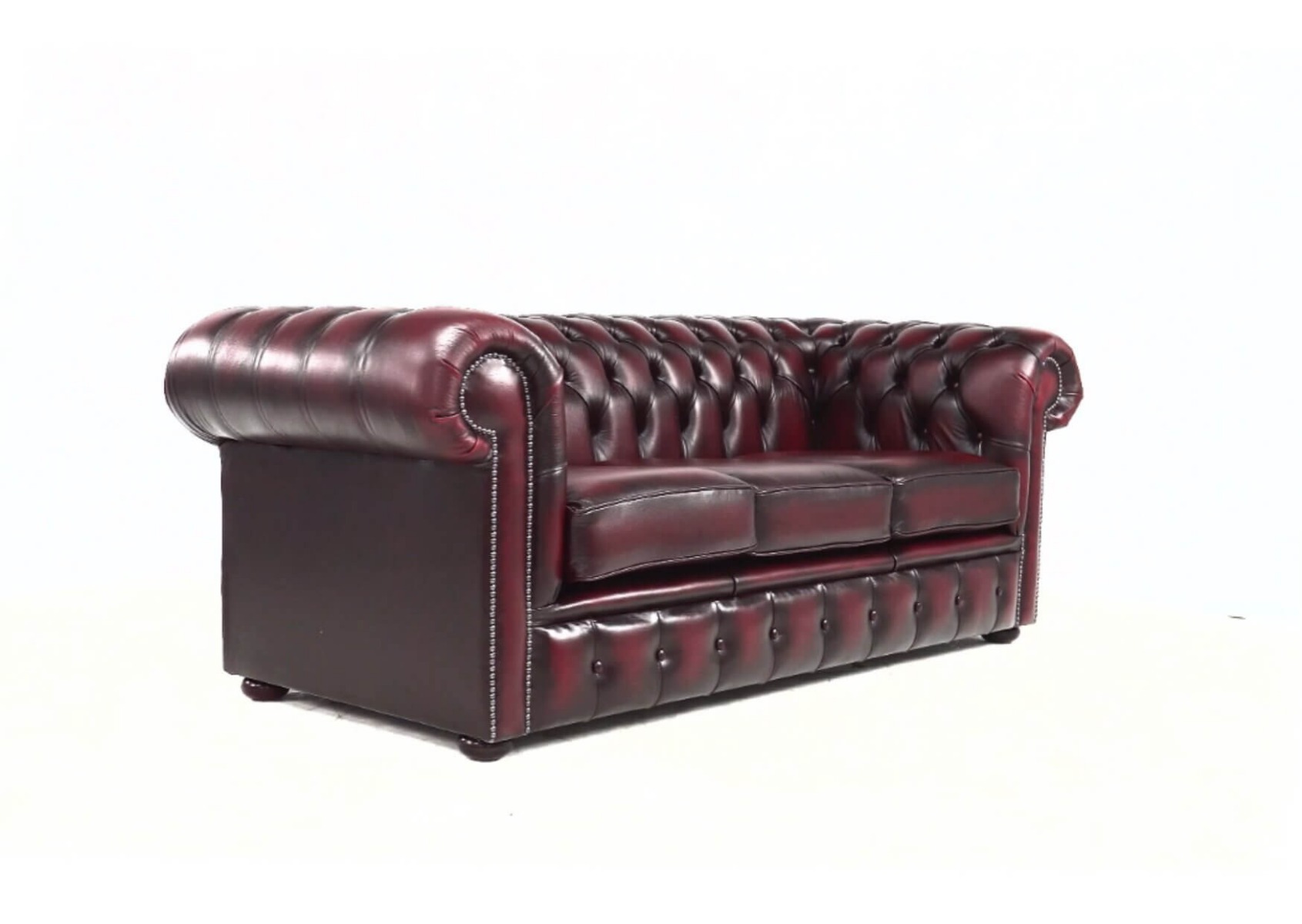 Product photograph of Chesterfield 3 Seater Antique Oxblood Red Real Leather Tufted Buttoned Sofa In Classic Style from Chesterfield Sofas.
