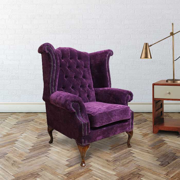 Product photograph of Chesterfield High Back Wing Chair Amethyst Purple Velvet Fabric In Queen Anne Style from Chesterfield Sofas.