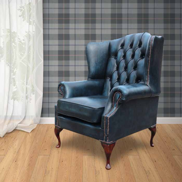 Product photograph of Chesterfield High Back Wing Chair Antique Blue Real Leather Bespoke In Mallory Style from Chesterfield Sofas