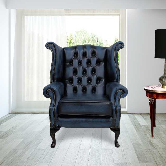 Product photograph of Chesterfield High Back Wing Chair Antique Blue Real Leather In Queen Anne Style from Chesterfield Sofas.
