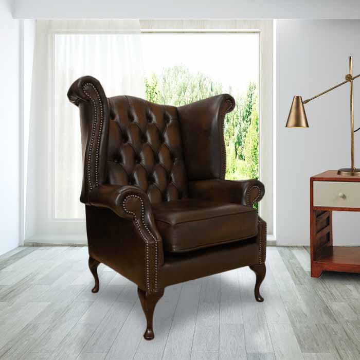 Product photograph of Chesterfield High Back Wing Chair Antique Brown Real Leather In Queen Anne Style from Chesterfield Sofas