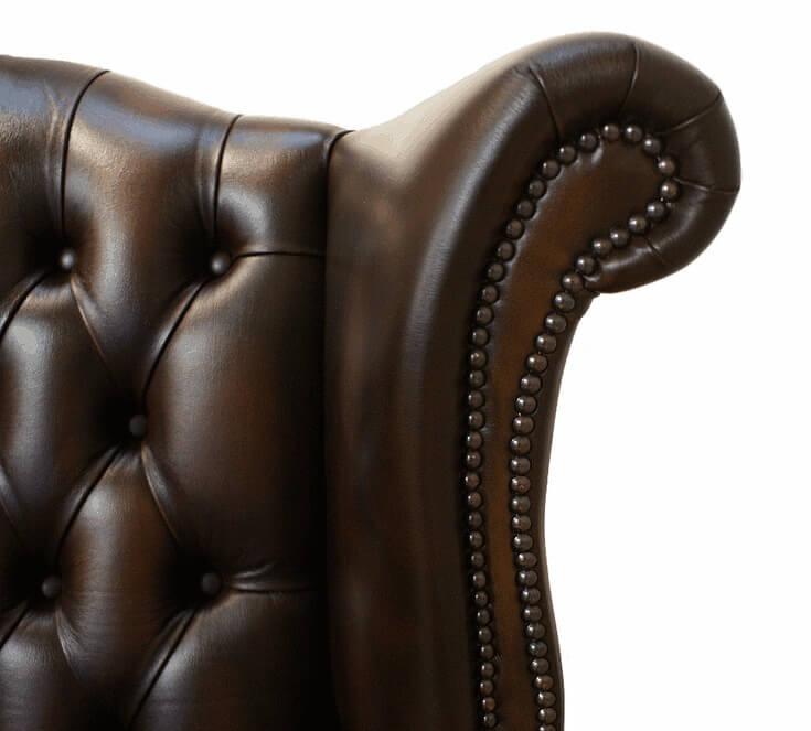 Product photograph of Chesterfield High Back Wing Chair Antique Brown Real Leather In Queen Anne Style from Chesterfield Sofas.