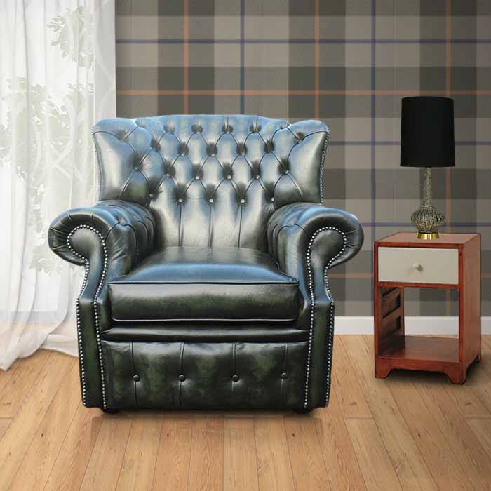 Product photograph of Chesterfield High Back Wing Chair Antique Green Leather Armchair In Monks Style from Chesterfield Sofas