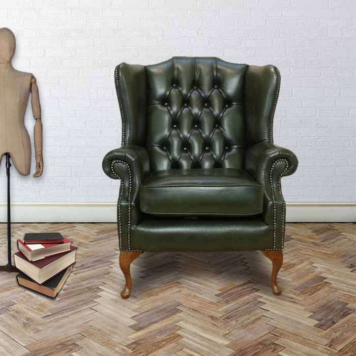 Product photograph of Chesterfield High Back Wing Chair Antique Green Real Leather Bespoke In Mallory Style from Chesterfield Sofas