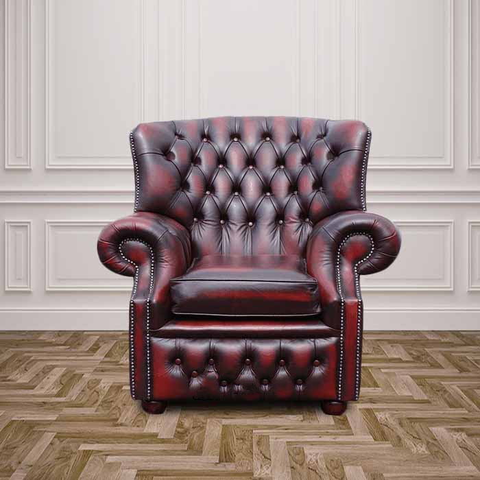 Product photograph of Chesterfield High Back Wing Chair Antique Oxblood Red Real Leather Armchair In Monks Style from Chesterfield Sofas