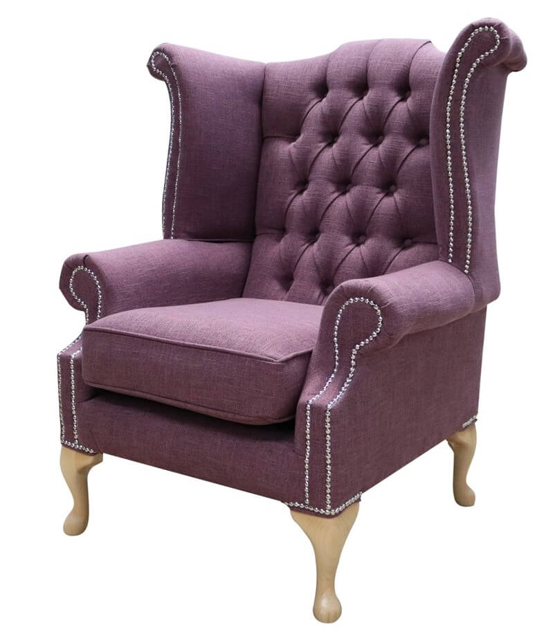 Product photograph of Chesterfield High Back Wing Chair Bacio Damson Purple Fabric In Queen Anne Style from Chesterfield Sofas.