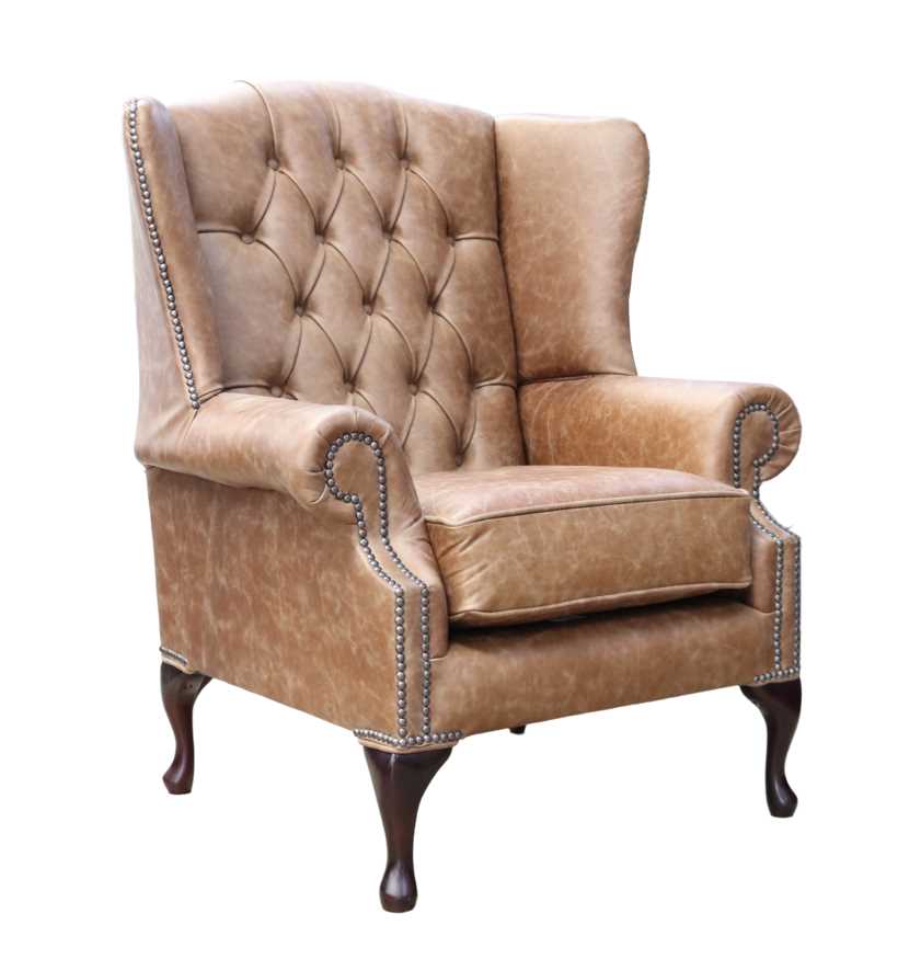 Product photograph of Chesterfield High Back Wing Chair Cracked Wax Tan Real Leather In Mallory Style from Chesterfield Sofas