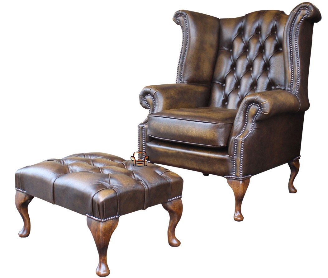Product photograph of Chesterfield High Back Wing Chair Footstool Antique Gold Leather In Queen Anne Style from Chesterfield Sofas.