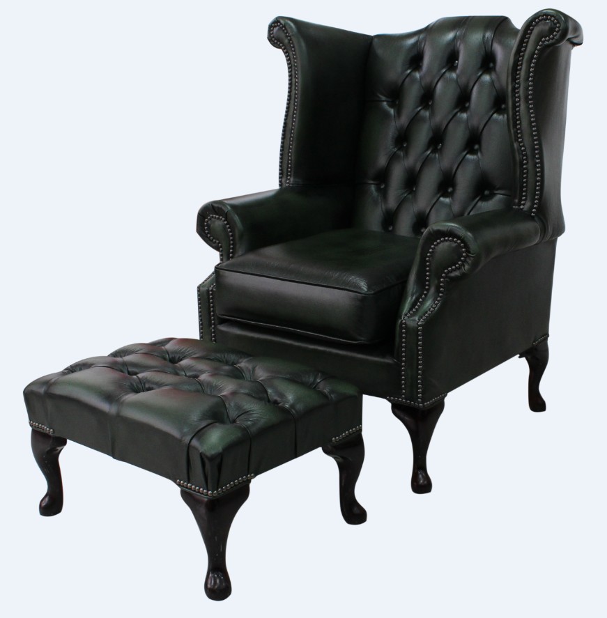 Product photograph of Chesterfield High Back Wing Chair Footstool Antique Green Leather In Queen Anne Style from Chesterfield Sofas.