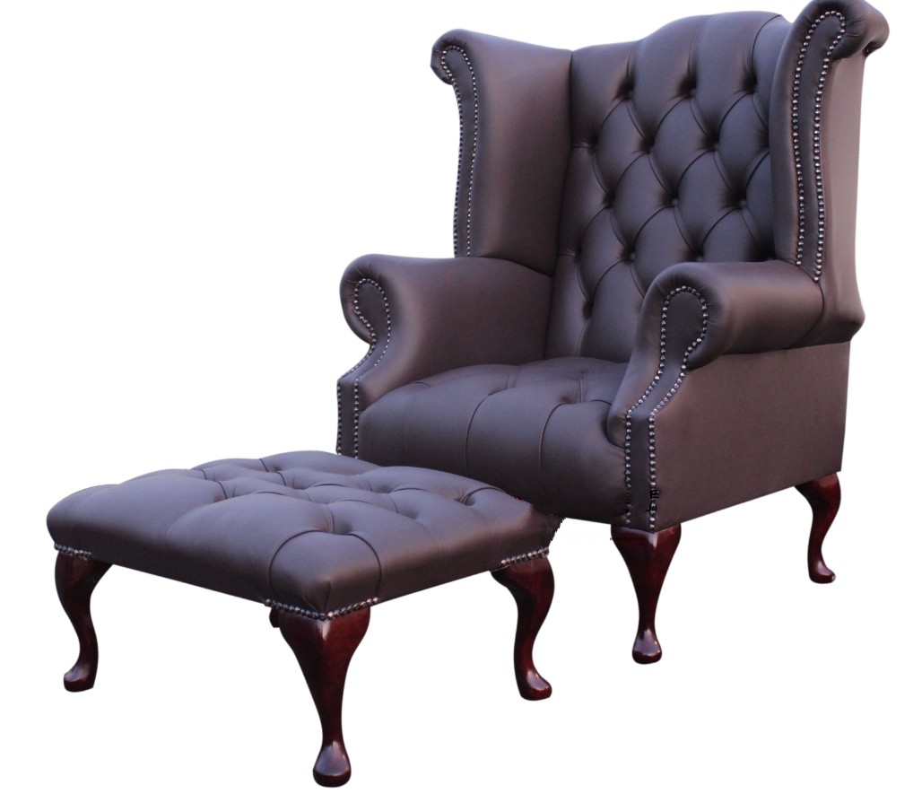 Product photograph of Chesterfield High Back Wing Chair Footstool Buttoned Seat Dark Chocolate Leather In Queen Anne Style from Chesterfield Sofas.