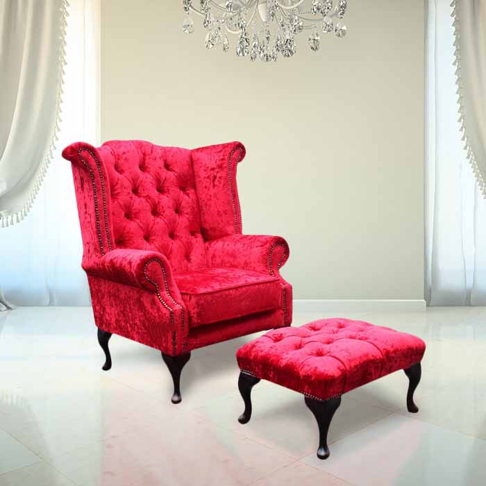 Product photograph of Chesterfield High Back Wing Chair Footstool Plush Red Velvet In Queen Anne Style from Chesterfield Sofas