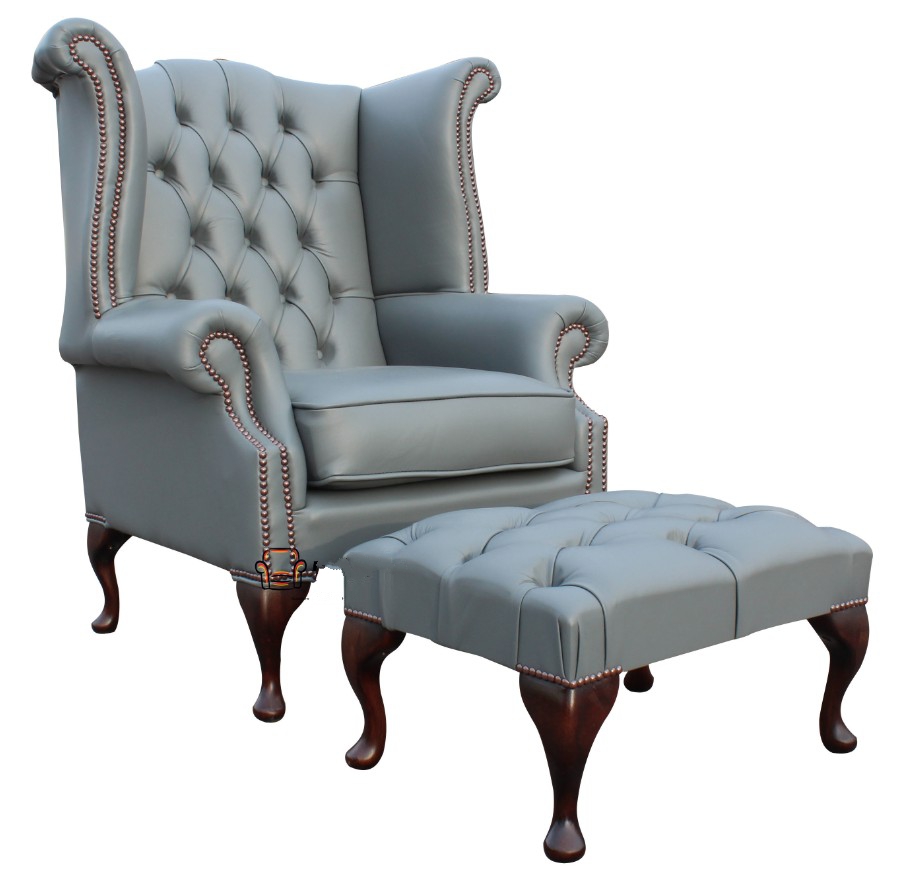 Product photograph of Chesterfield High Back Wing Chair Footstool Vele Soft Iron Grey Leather In Queen Anne Style from Chesterfield Sofas.