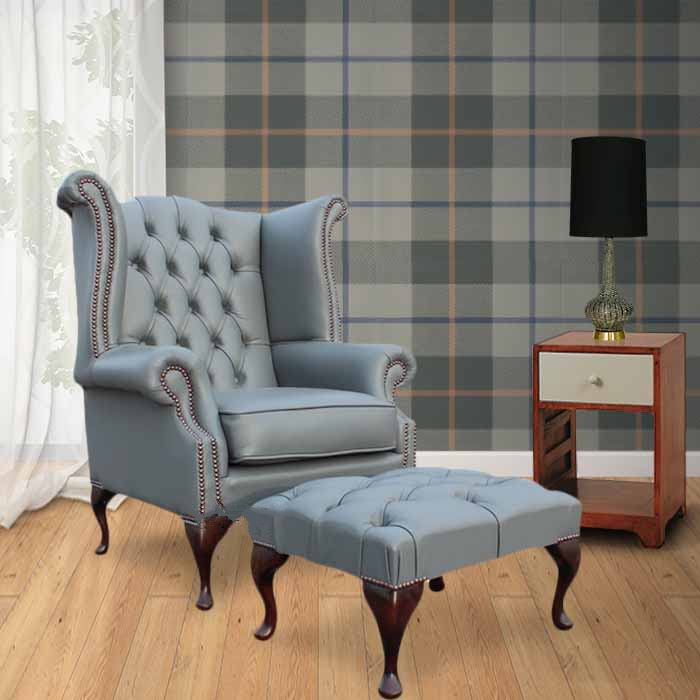 Product photograph of Chesterfield High Back Wing Chair Footstool Vele Soft Iron Grey Leather In Queen Anne Style from Chesterfield Sofas