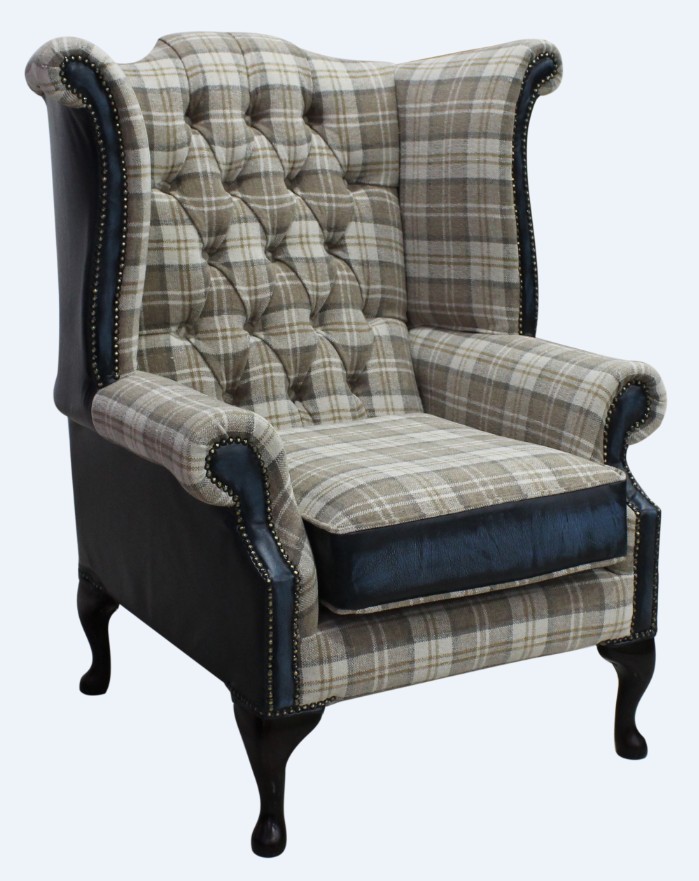 Product photograph of Chesterfield High Back Wing Chair Lana Beige Fabric Antique Blue Leather In Queen Anne Style from Chesterfield Sofas