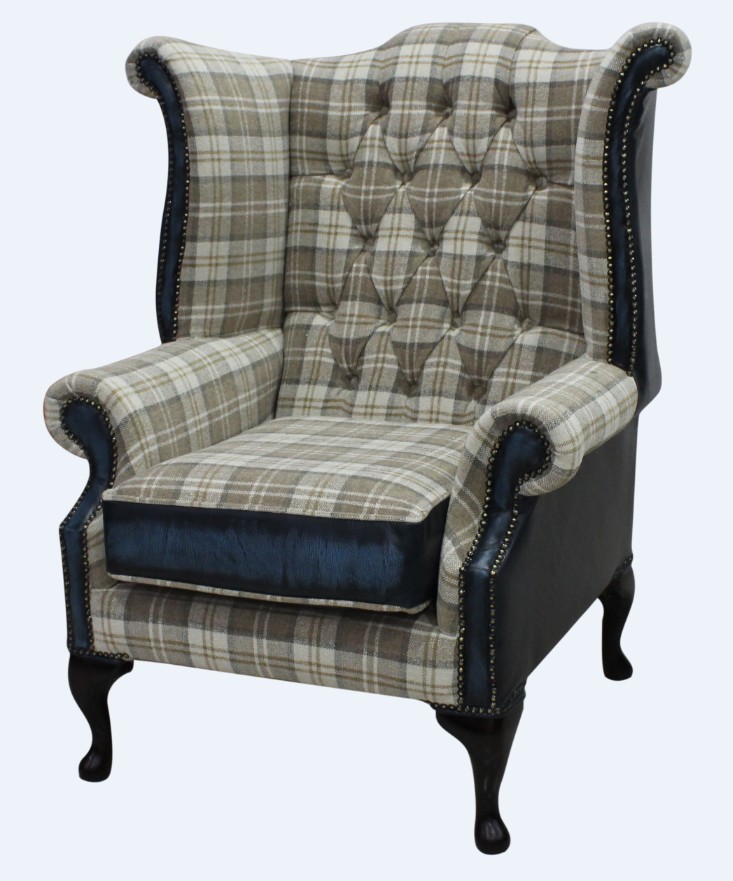 Product photograph of Chesterfield High Back Wing Chair Lana Beige Fabric Antique Blue Leather In Queen Anne Style from Chesterfield Sofas.
