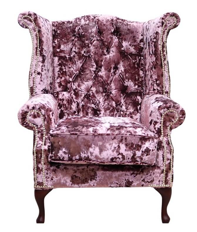 Product photograph of Chesterfield High Back Wing Chair Lustro Blush Velvet In Queen Anne Style from Chesterfield Sofas.