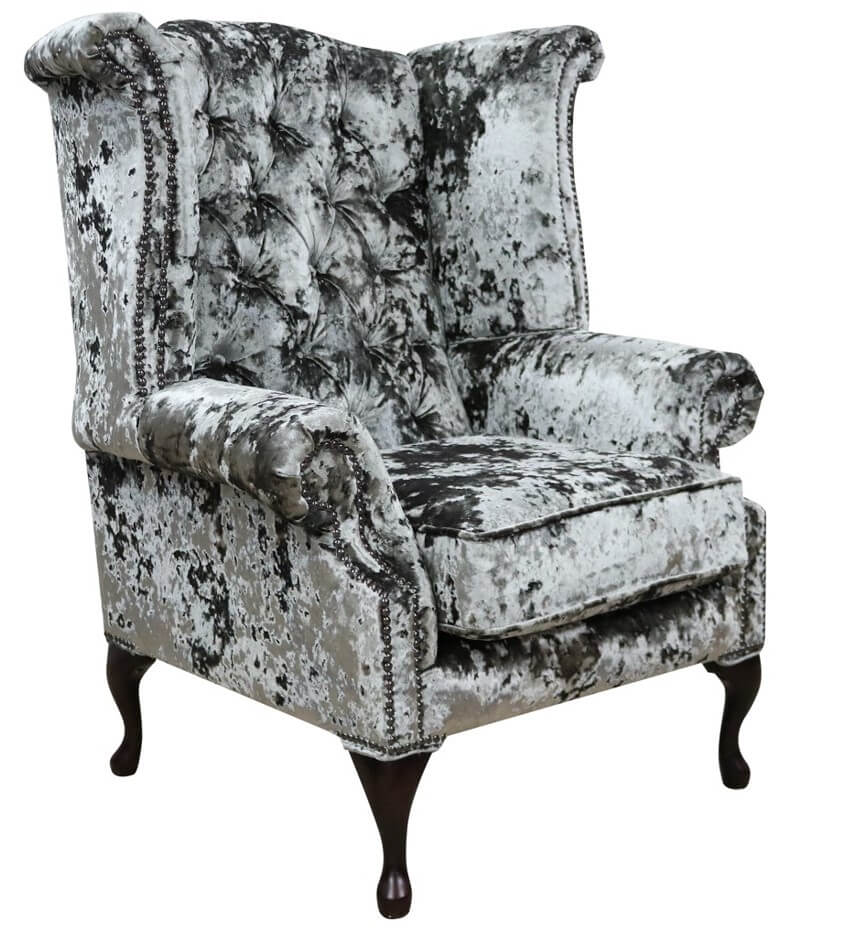 Product photograph of Chesterfield High Back Wing Chair Lustro Minstral Velvet In Queen Anne Style from Chesterfield Sofas