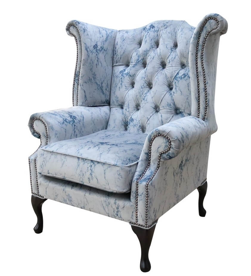 Product photograph of Chesterfield High Back Wing Chair Marble Effect Velvet Fabric In Queen Anne Style from Chesterfield Sofas.