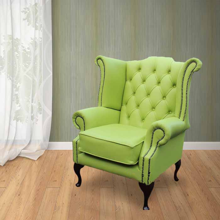 Product photograph of Chesterfield High Back Wing Chair Melon Green Leather In Queen Anne Style from Chesterfield Sofas