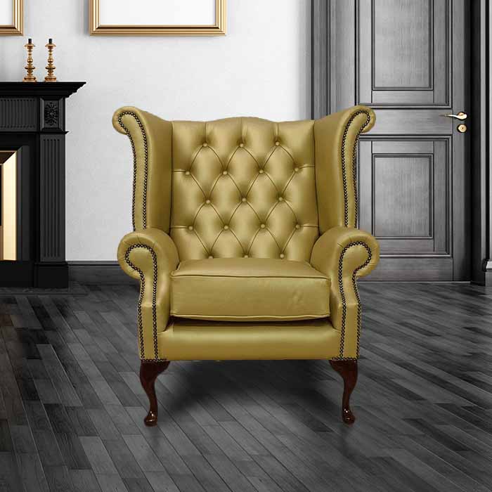 Product photograph of Chesterfield High Back Wing Chair Metallic Gold Leather In Queen Anne Style from Chesterfield Sofas