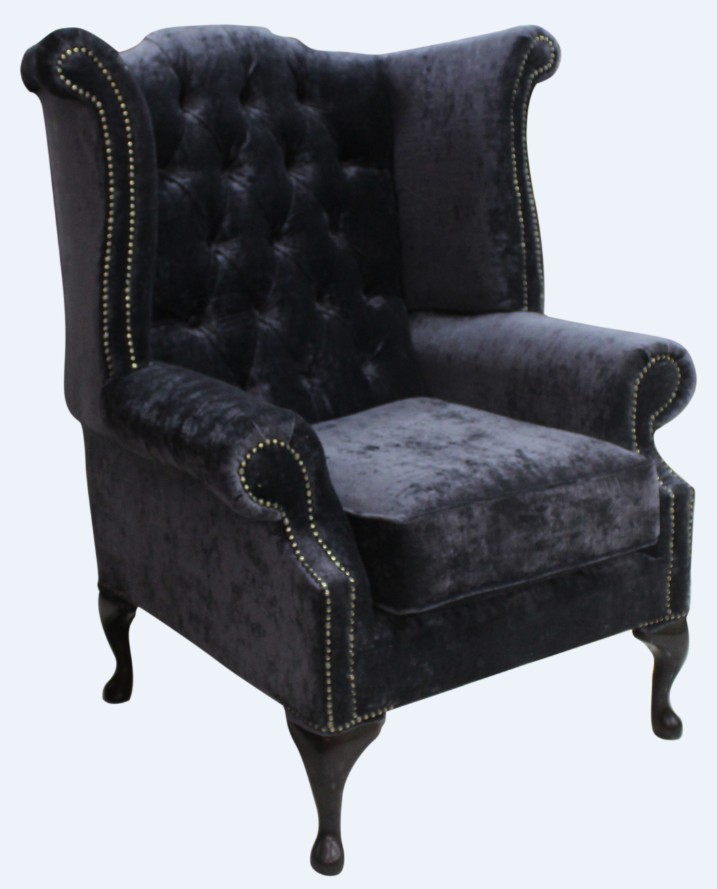 Product photograph of Chesterfield High Back Wing Chair Modena Midnight Black Velvet In Queen Anne Style from Chesterfield Sofas.