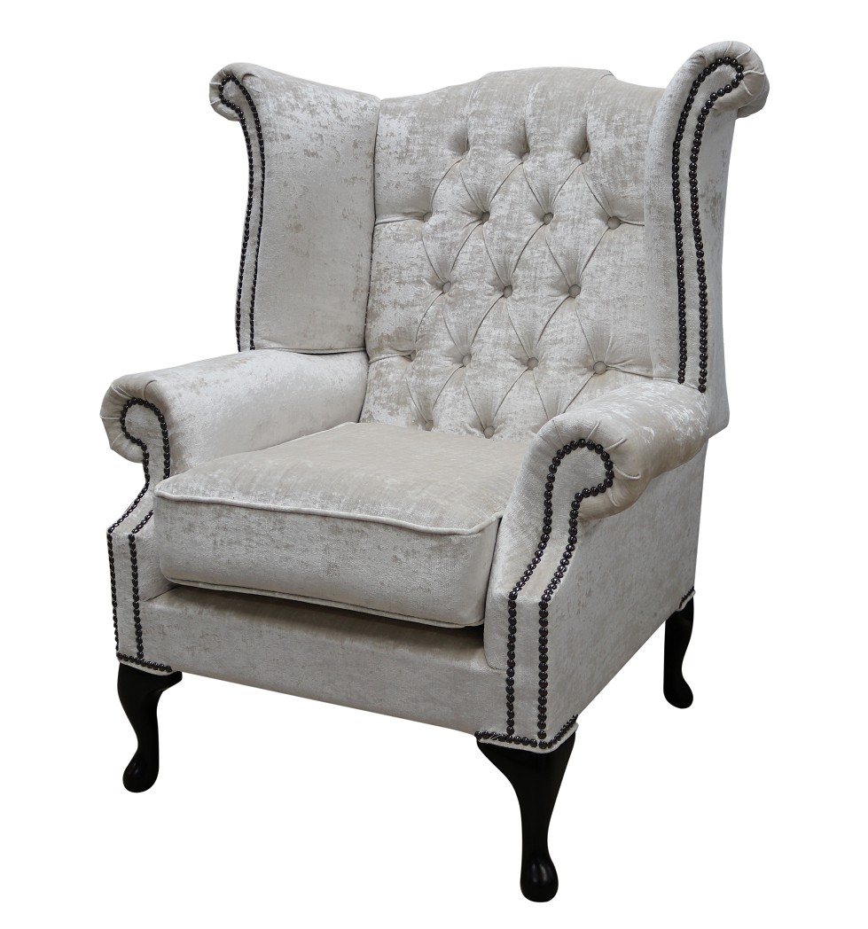 Product photograph of Chesterfield High Back Wing Chair Modena Oyster Velvet Fabric In Queen Anne Style from Chesterfield Sofas.