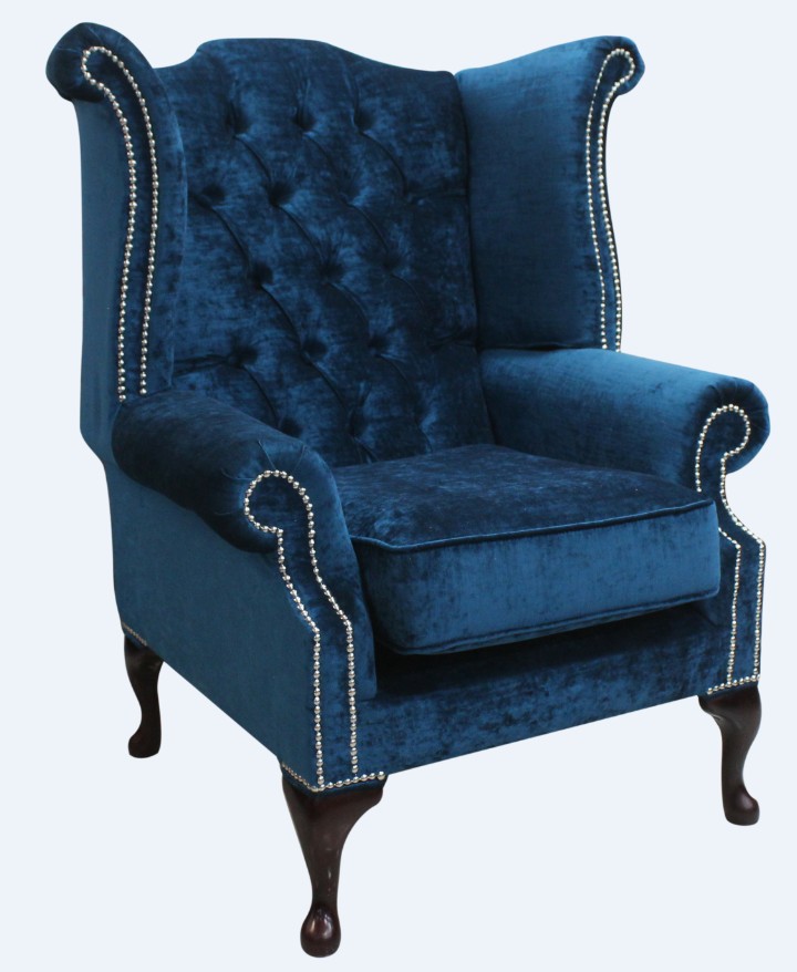 Product photograph of Chesterfield High Back Wing Chair Pastiche Petrol Blue Velvet In Queen Anne Style from Chesterfield Sofas.