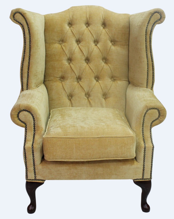 Product photograph of Chesterfield High Back Wing Chair Velluto Gold Fabric In Queen Anne Style from Chesterfield Sofas.