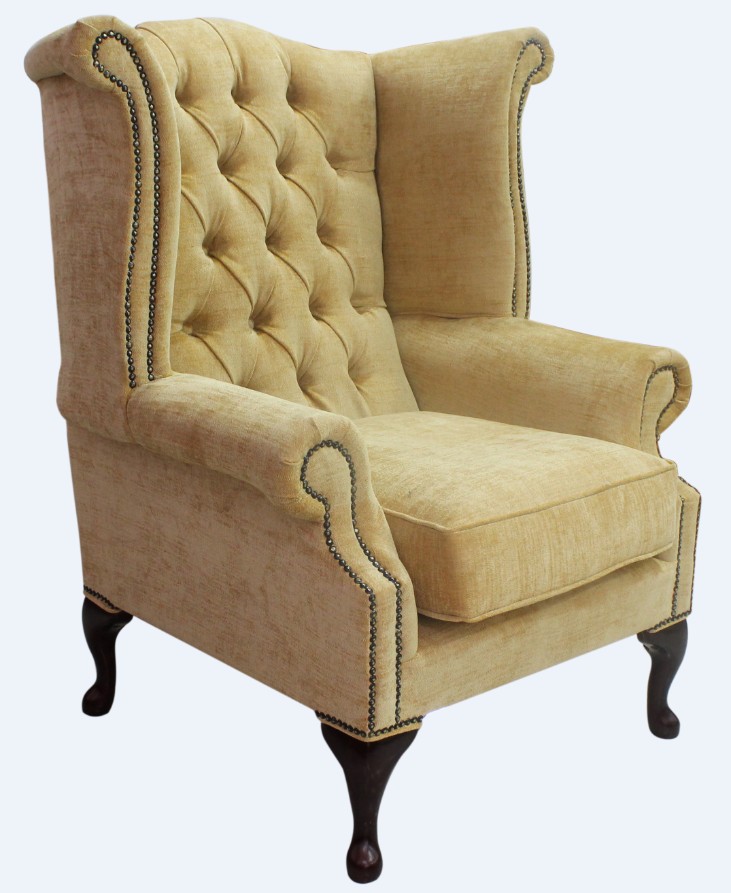 Product photograph of Chesterfield High Back Wing Chair Velluto Gold Fabric In Queen Anne Style from Chesterfield Sofas