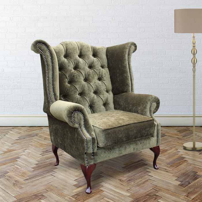 Product photograph of Chesterfield High Back Wing Chair Velluto Moss Green Velvet Fabric In Queen Anne Style from Chesterfield Sofas